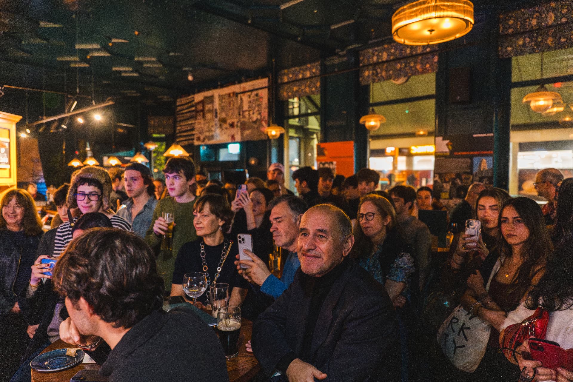 Audience enjoying live music in a Kilburn pub